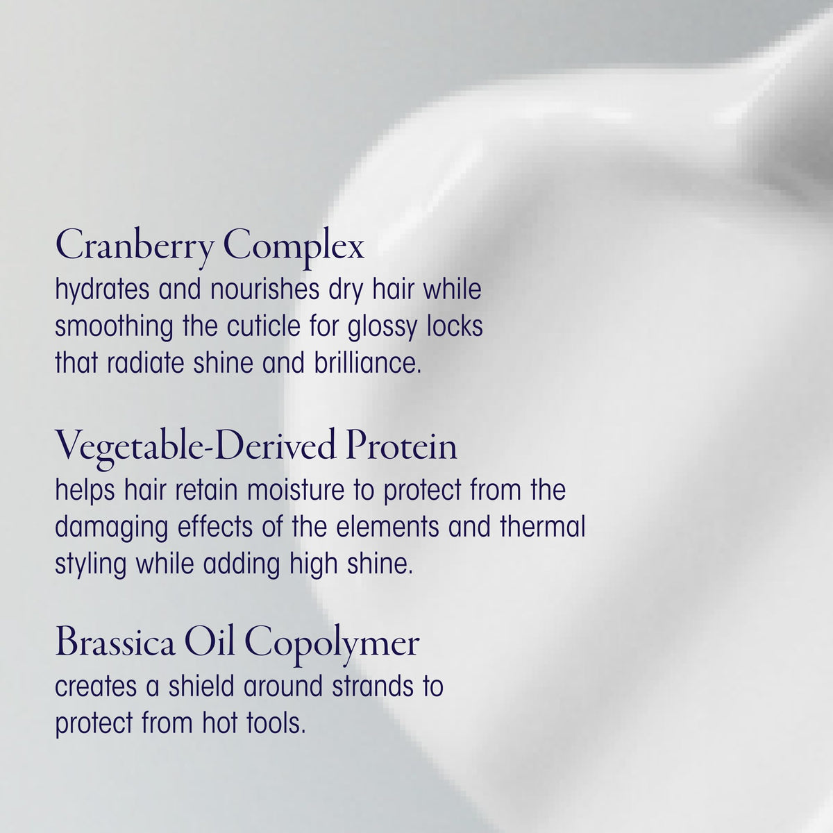 Oribe Supershine applied to damp hair reducing frizz and aiding styling