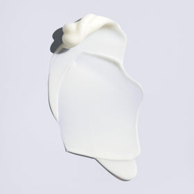 Oribe Supershine bottle in hand demonstrating 5 oz size and portability