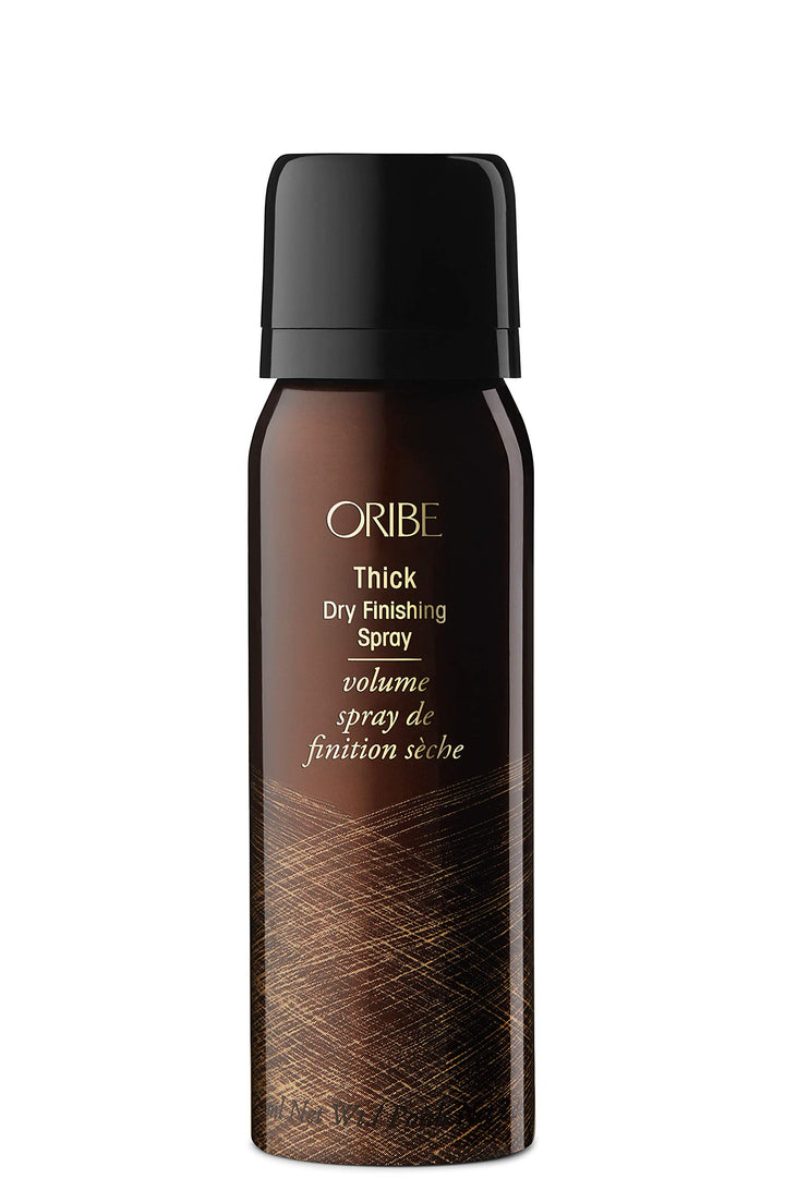Oribe Thick Dry Finishing Spray front bottle showing branding and compact size for travel