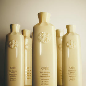 ORIBE vanity lifestyle scene conveying salon-quality daily use benefit