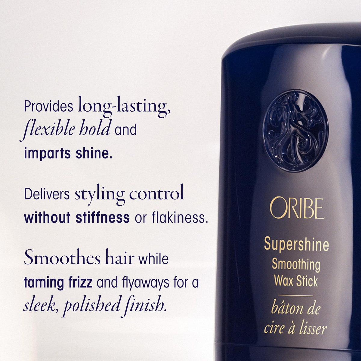 Applying Oribe Supershine wax stick to hairline taming flyaways for smooth finish