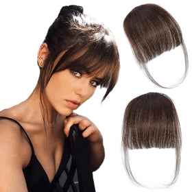 ORIGEN front view of dark brown clip-in bangs showing natural blend benefit