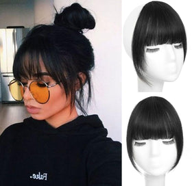 ORIGEN front view jet black bangs showing natural fringe and instant style