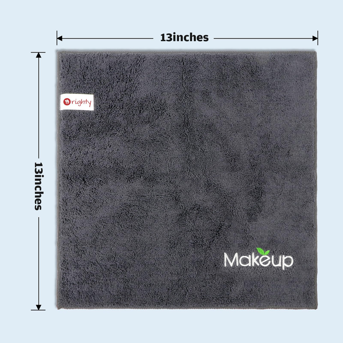 Orighty grey washcloth folded on bathroom counter offering quick-dry convenience