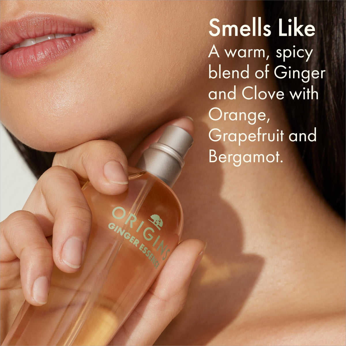 Origins perfume mist spraying to show fine mist and easy application