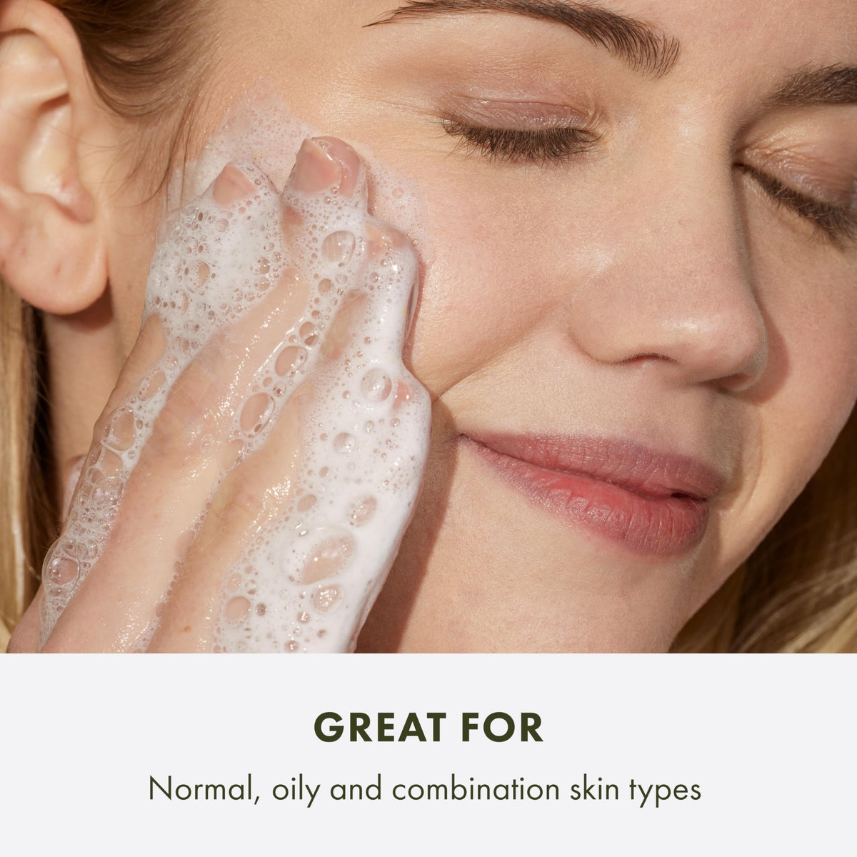 Origins GinZing being rinsed at sink, illustrating gentle cleansing and revitalized skin