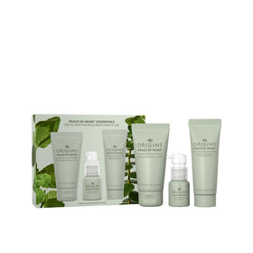 Origins front packaging of the travel peace of mind set showing trio and benefit