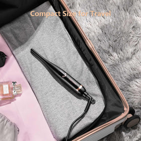 ORYNNE size comparison handheld demonstrating portable scale and travel convenience benefit