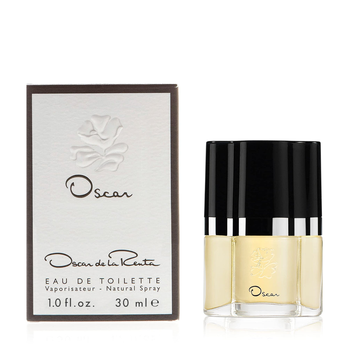 Oscar de la Renta bottle front view showing elegant design and travel-ready size