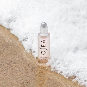OSEA application demo rolling serum under eye to reduce puffiness and awaken eyes