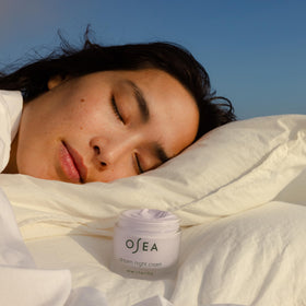 OSEA hand applying cream illustrating easy absorption and overnight moisture
