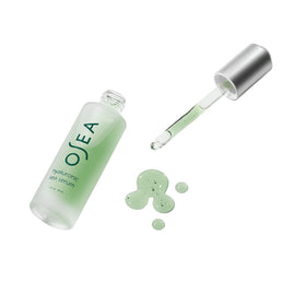 OSEA serum used in morning skincare routine demonstrating layering under moisturizer