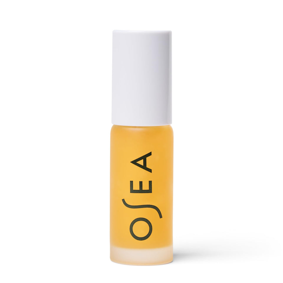 OSEA lip oil front packaging showing glossy clear bottle and branding benefit high-shine