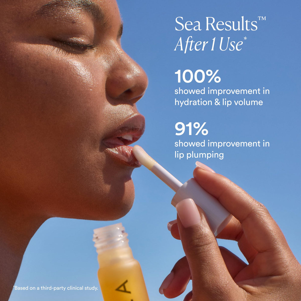 OSEA lip oil in hand for size and scale showing travel-friendly design benefit portability