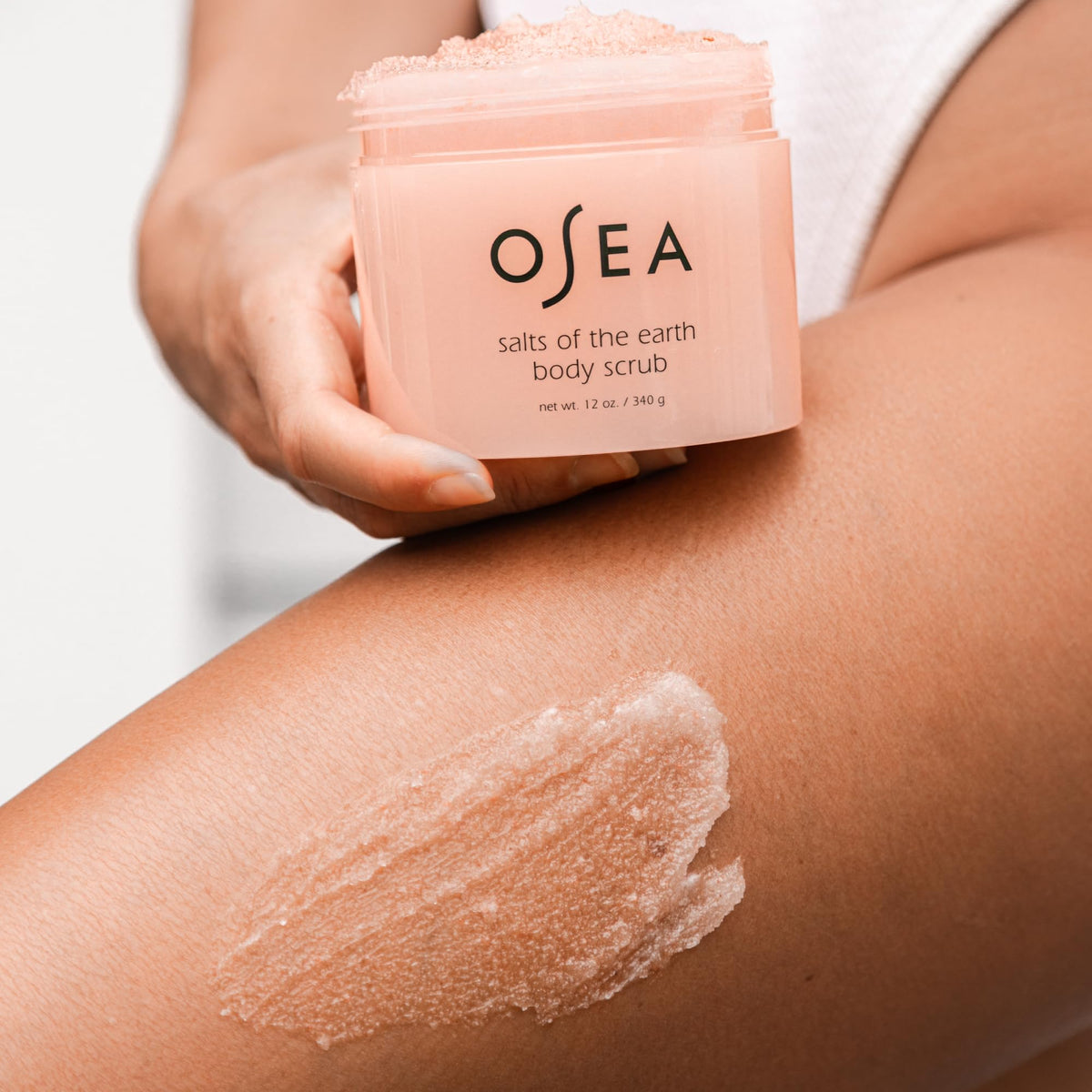OSEA close-up of pink salt texture and creamy base, reveals gentle exfoliation