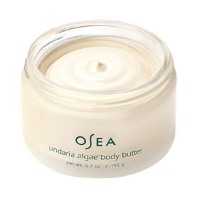 OSEA jar open with whipped body butter showing rich texture and hydration benefit