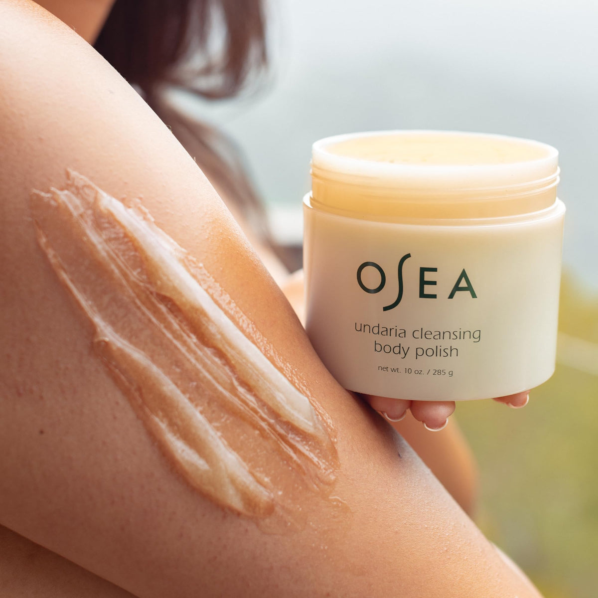 OSEA pumice granules macro detail showing gentle buffing benefit