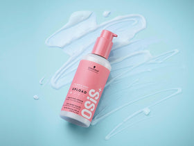 OSiS+ product distributed on damp hair ready for round-brush blow-dry styling