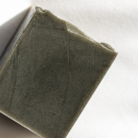 Osmia soap lather in hands producing white foam for gentle cleansing