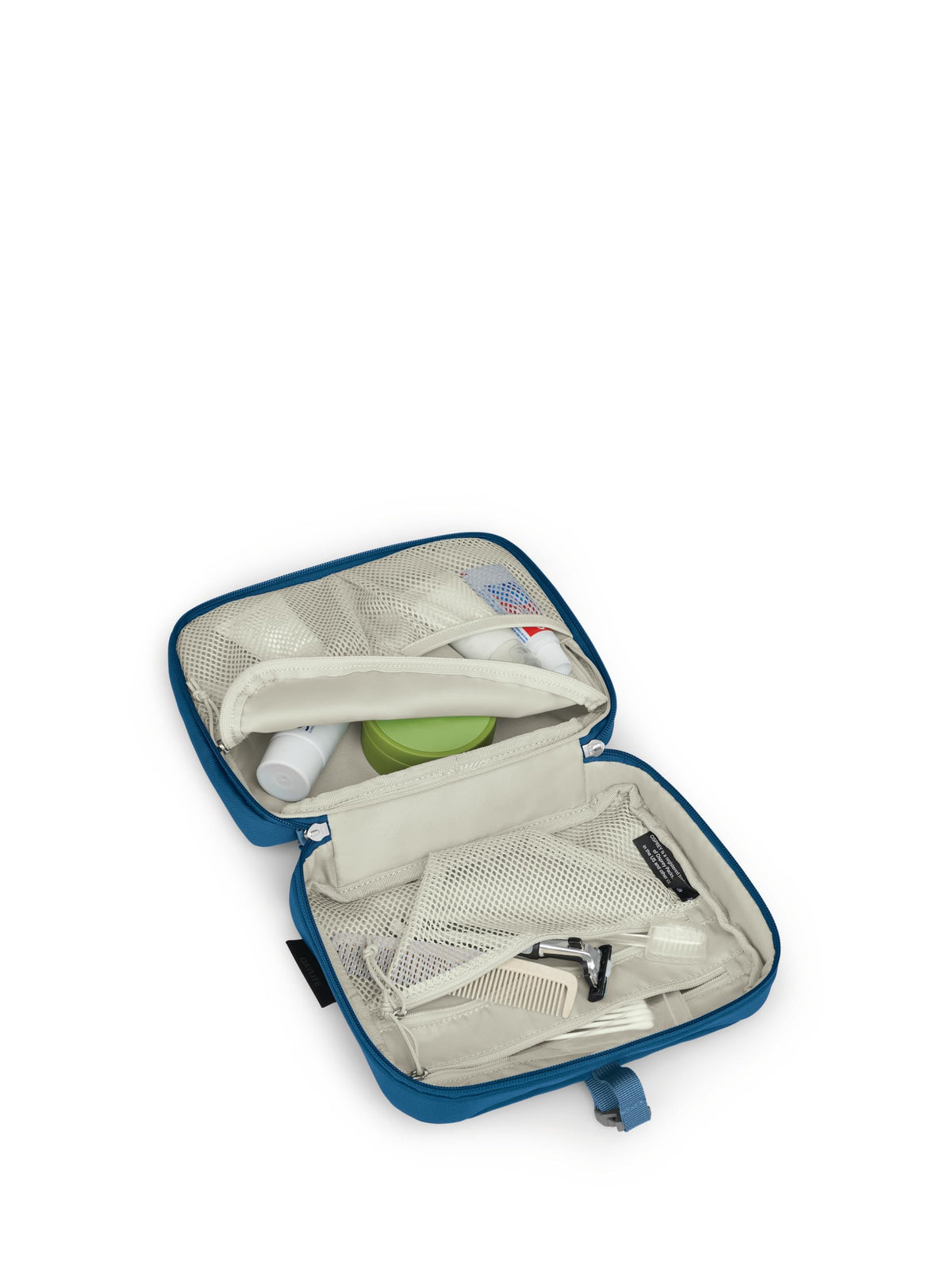 Osprey Daylite next to travel bottles showing size and packing benefit