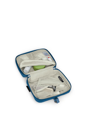 Osprey Daylite next to travel bottles showing size and packing benefit