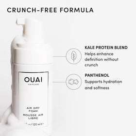 Applying OUAI foam into damp hair for instant detangling benefit