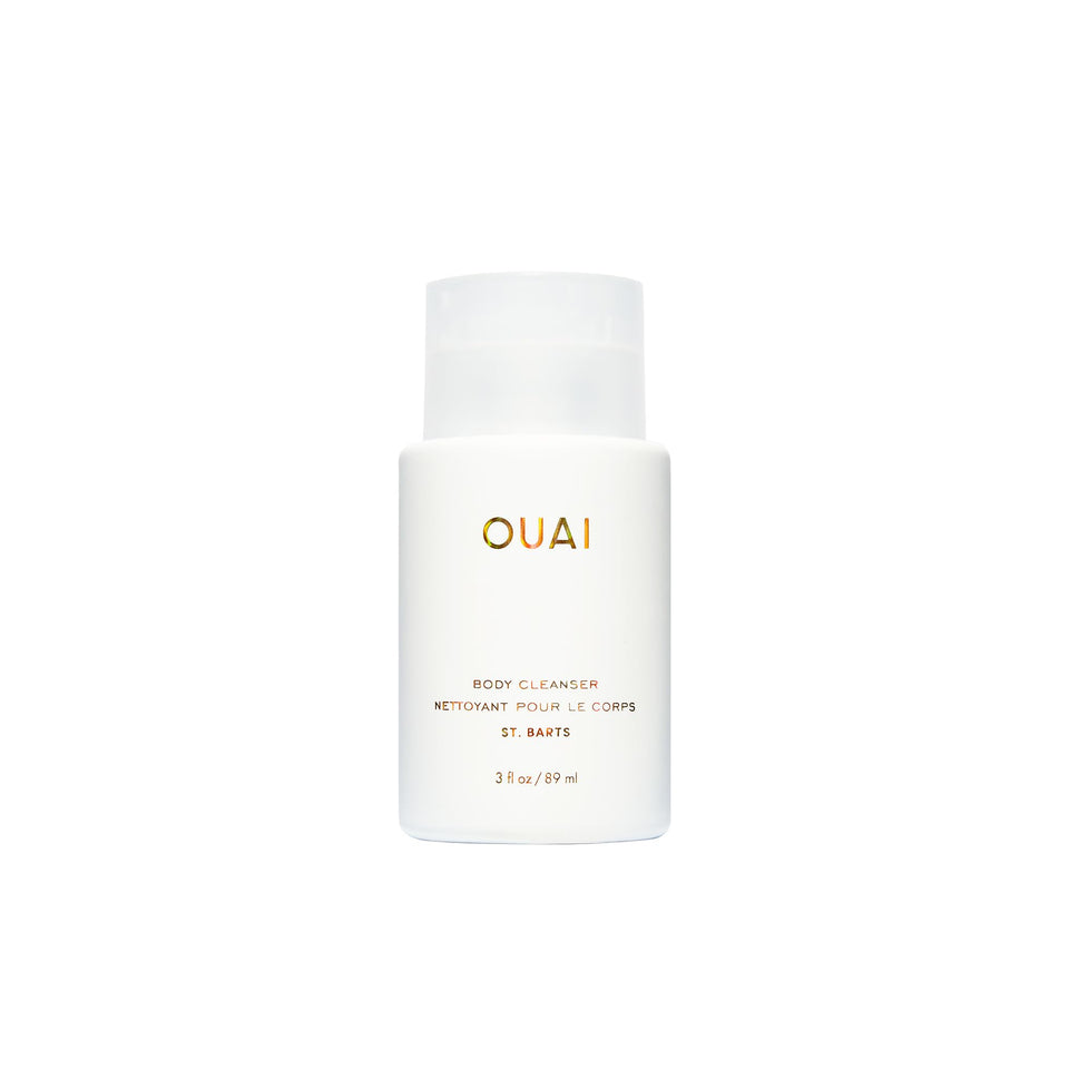 OUAI bottle front packaging showing travel-friendly design and scent