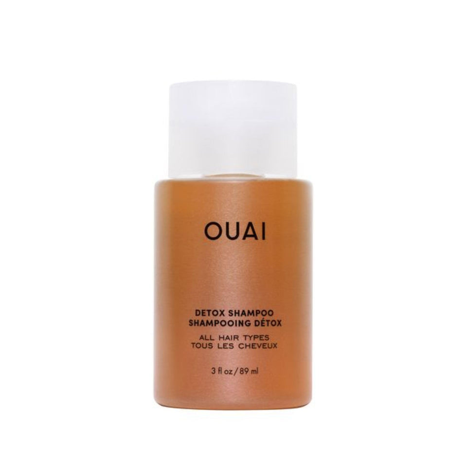 OUAI Detox Shampoo front view showing compact travel bottle and branding benefit