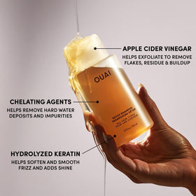 OUAI detox shampoo inside toiletry bag illustrating travel readiness