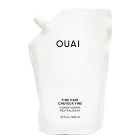 OUAI refill bottle front view showing clean packaging and volume benefit