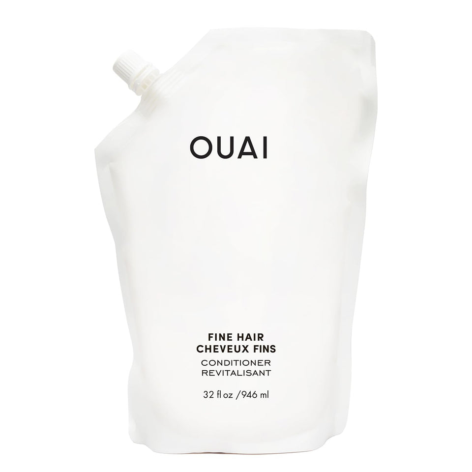 OUAI refill bottle front view showing clean packaging and volume benefit