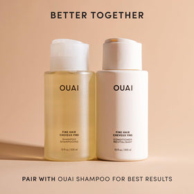OUAI conditioner pouring from bottle illustrating easy dispensing benefit