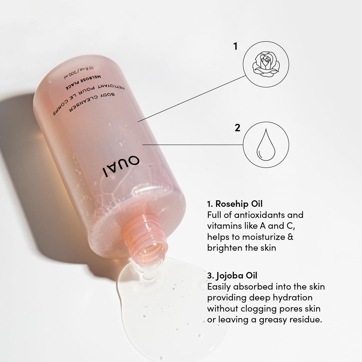 OUAI foaming lather in hand demonstrating rich suds and gentle cleanse benefit: shows usage