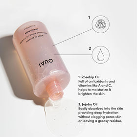 OUAI foaming lather in hand demonstrating rich suds and gentle cleanse benefit: shows usage