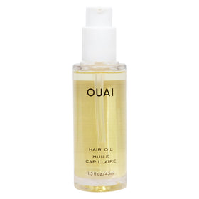 OUAI hair oil front bottle showing sleek packaging and benefit of shine