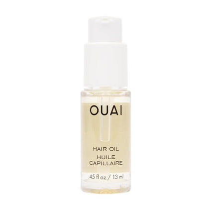 OUAI travel hair oil front bottle showing compact packaging and portability benefit