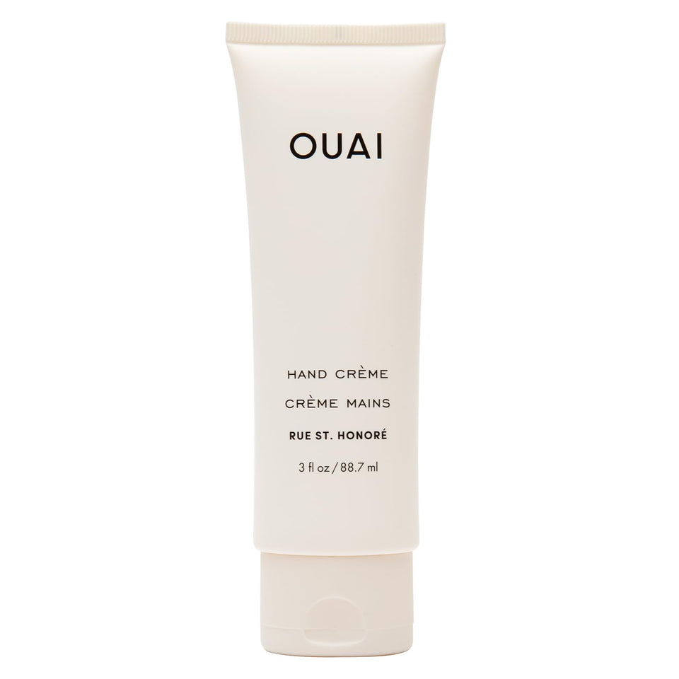 OUAI hand cream front tube showing packaging and benefit of portable hydration