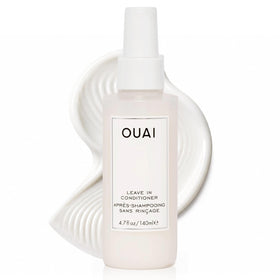 OUAI bottle front view showing product branding and size benefits