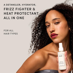 OUAI spray in action misting hair for effortless detangling and slip