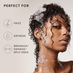 OUAI marshmallow root ingredient photo highlighting detangling benefits