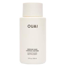 OUAI medium conditioner front bottle showing clean design and brand hydration benefit