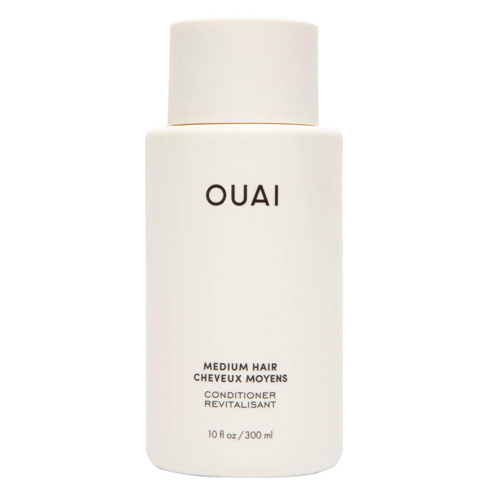 OUAI medium conditioner front bottle showing clean design and brand hydration benefit