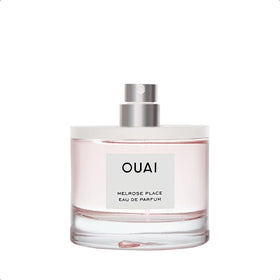 OUAI box and cap close-up highlighting packaging detail and gift-ready appeal