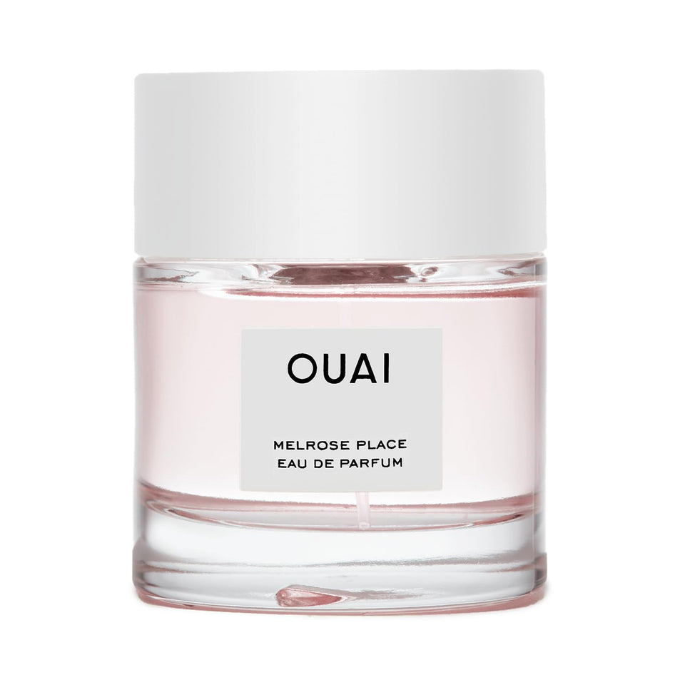 OUAI bottle front view showing elegant design and everyday wear benefit