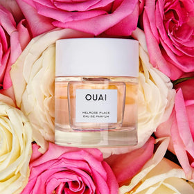 OUAI fragrance notes label close-up showing ingredients and scent clarity benefit
