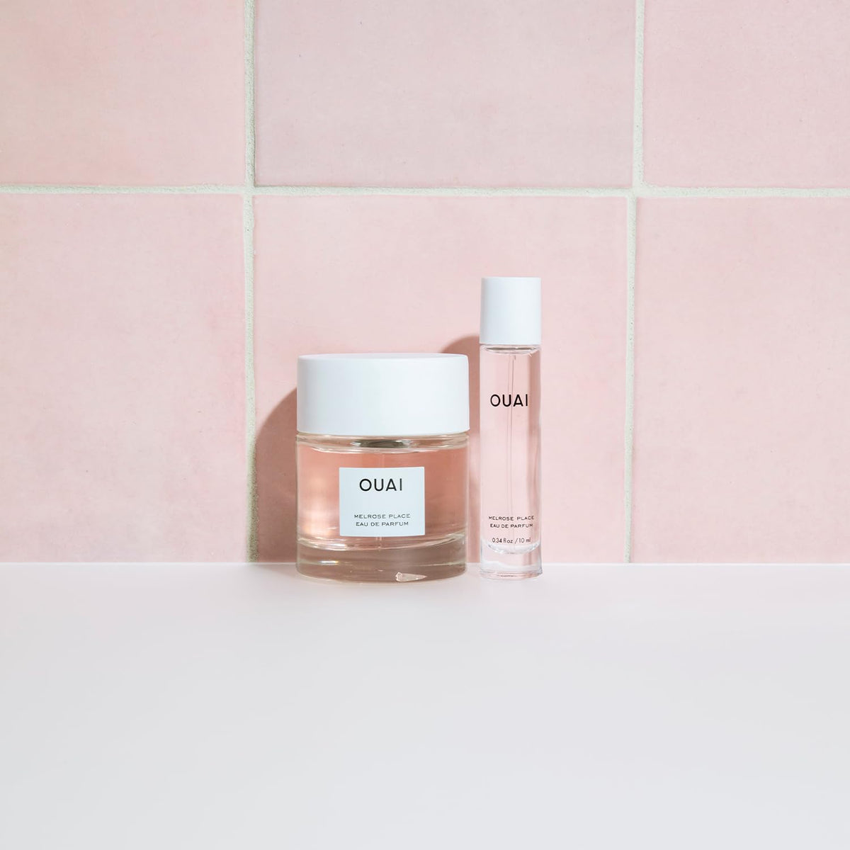 OUAI Melrose Place next to credit card showing travel size convenience