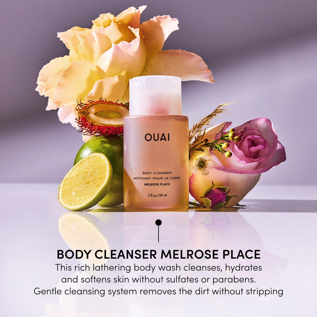OUAI in-hand travel bottle illustrating compact size for travel convenience