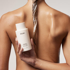OUAI conditioner being dispensed from pump showing controlled portion and easy use benefit