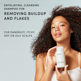 OUAI shampoo back label with ingredients list for informed ingredient choices