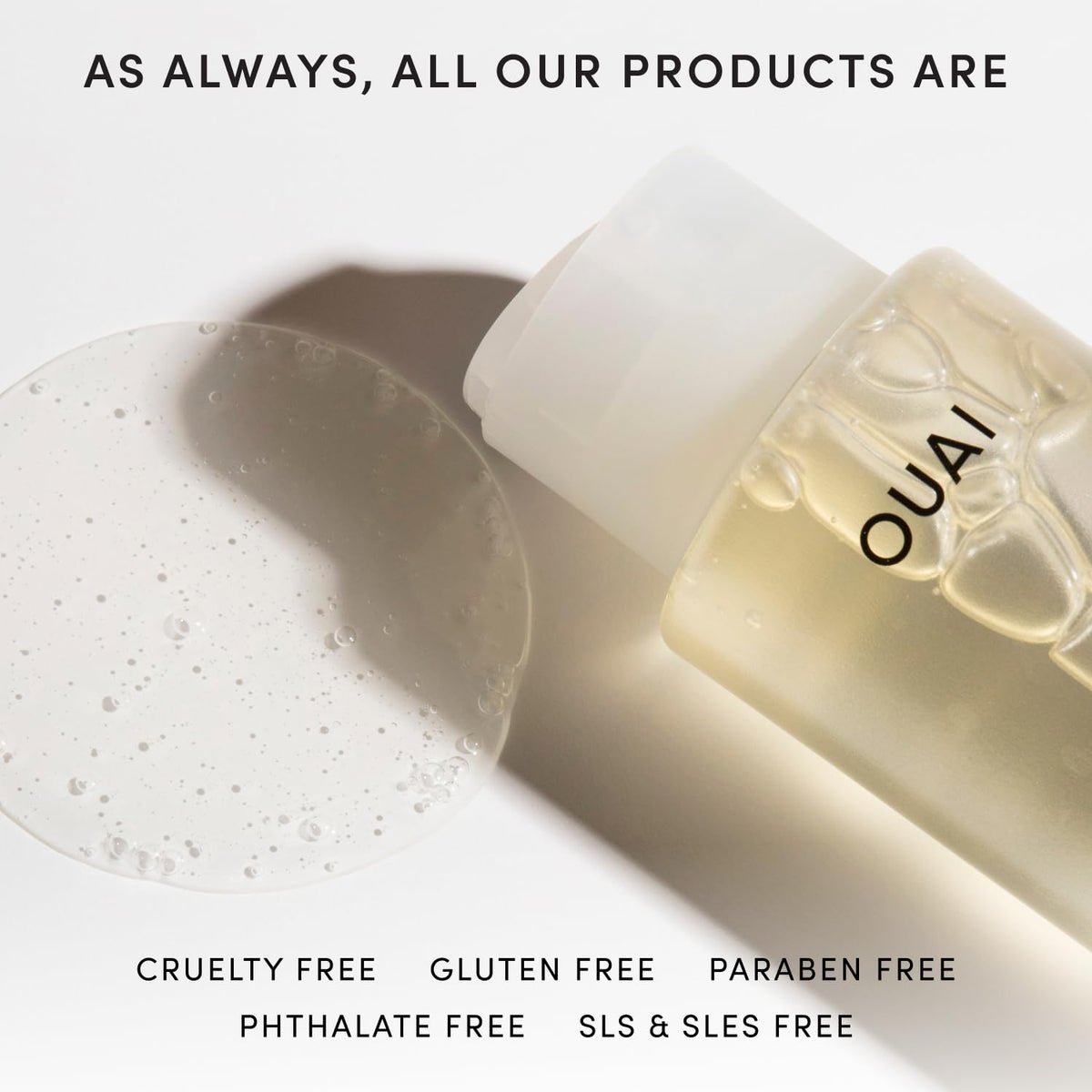 OUAI shampoo paired with thickening spray suggesting layered routine for added lift